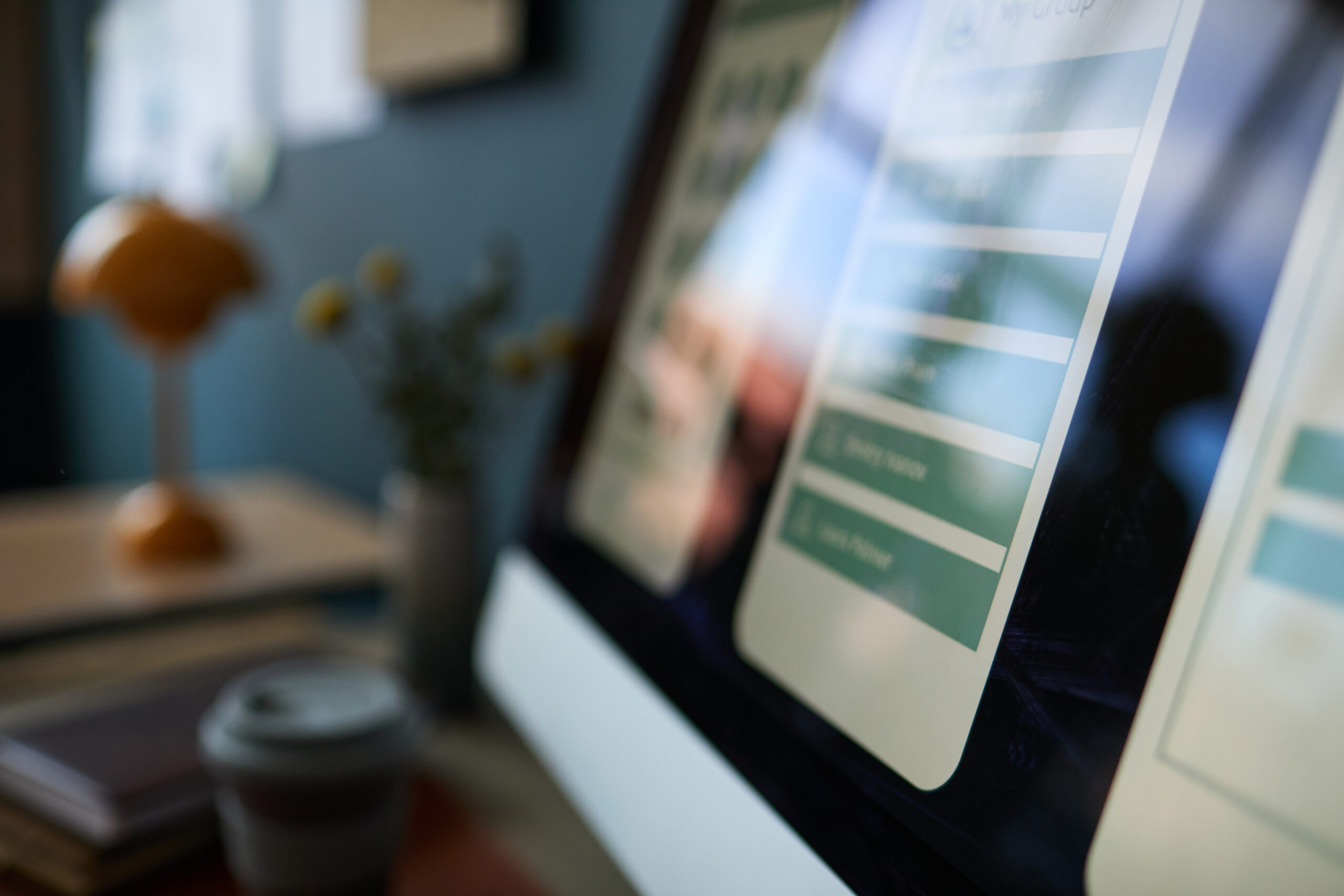Close-up of a business website displayed on a desktop monitor, representing outdated website technology and digital debt.
